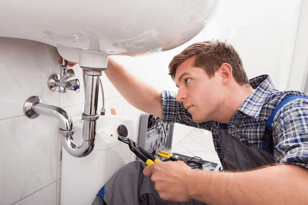 Plumbers working at home